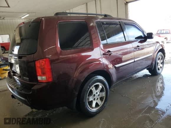 2010 Honda Pilot Touring with VIN 5FNYF4H8XAB018317, listed as a Copart auction lot 80478455 with 242,330 mi miles and Salvage title. Bid and sale history available at DreamBid. Image 3.