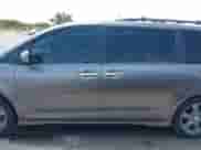 2014 Toyota Sienna SE with VIN 5TDXK3DC7ES487541, listed as a IAAI auction lot 42998929 with 214,475 mi miles and . Bid and sale history available at DreamBid. Image 15.