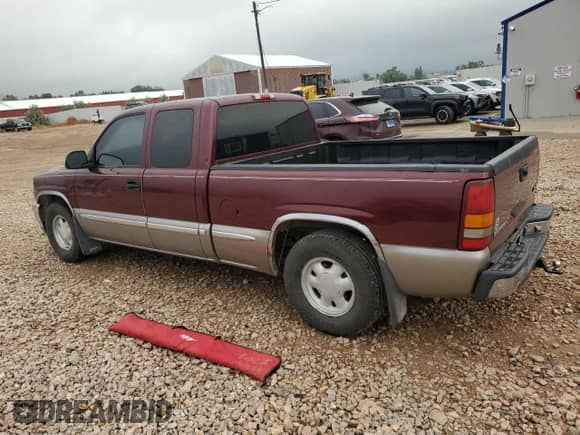 2000 GMC Sierra 1500 SLE with VIN 2GTEC19V3Y1296875, listed as a Copart auction lot 66842935 with 100,494 mi miles and Clean title. Bid and sale history available at DreamBid. Image 2.