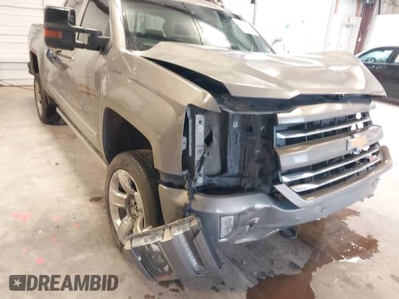 2017 Chevrolet Silverado 1500 LTZ z VIN 3GCUKSEJ4HG328926, wystawiony jako IAAI lot #41125958 z przebiegiem 248 071 mil mil oraz . Historia ofert i sprzedaży dostępna na DreamBid. Obrazek 18.