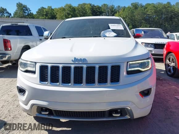 2016 Jeep Grand Cherokee High Altitude with VIN 1C4RJECG0GC335911, listed as a IAAI auction lot 43091451 with 150,848 mi miles and . Bid and sale history available at DreamBid. Image 12.