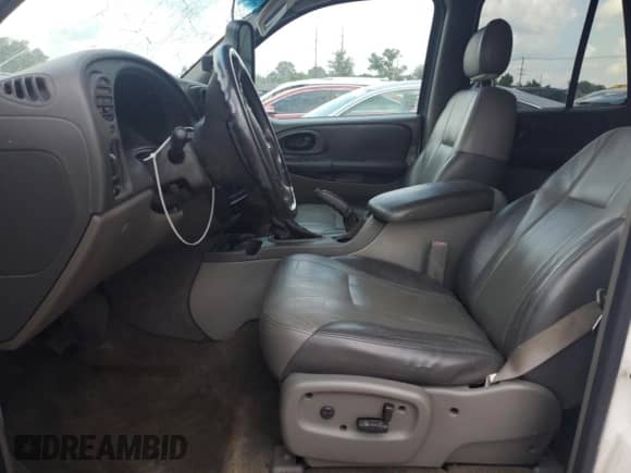 2003 Chevrolet TrailBlazer LT с VIN 1GNDT13SX32359741, выставлен на аукционе Copart как лот 69097455 с пробегом 166 341 миль миль и На запчасти • Non repairable. История ставок и продаж доступна на DreamBid. Изображение 7.
