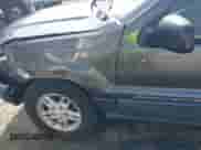 2003 Jeep Grand Cherokee Laredo z VIN 1J4GX48S63C578270, wystawiony jako IAAI lot #42656724 z przebiegiem 216 000 mil mil oraz . Historia ofert i sprzedaży dostępna na DreamBid. Obrazek 6.