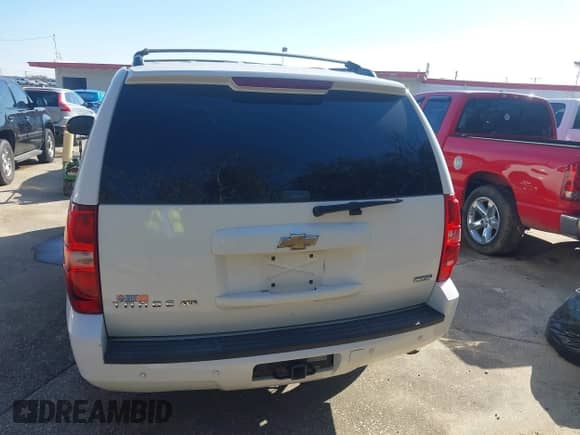 2009 Chevrolet Tahoe 1LT z VIN 1GNEC233X9R303463, wystawiony jako IAAI lot #41277814 z przebiegiem 217 701 mil mil oraz . Historia ofert i sprzedaży dostępna na DreamBid. Obrazek 16.