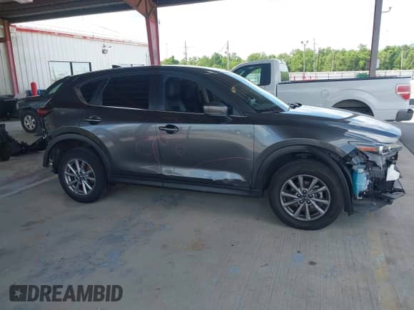 2023 Mazda CX-5 S Carbon Edition z VIN JM3KFBCM8P0251108, wystawiony jako IAAI lot #42171155 z przebiegiem 45 551 mil mil oraz . Historia ofert i sprzedaży dostępna na DreamBid. Obrazek 14.