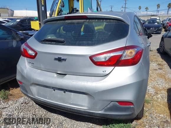 2018 Chevrolet Cruze LT with VIN 3G1BE6SM0JS649474, listed as a IAAI auction lot 43141912 with 26,647 mi miles and . Bid and sale history available at DreamBid. Image 17.