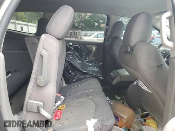 2012 Chevrolet Traverse LS with VIN 1GNKRFED7CJ208864, listed as a Copart auction lot 83832215 with 176,623 mi miles and Salvage title. Bid and sale history available at DreamBid. Image 11.