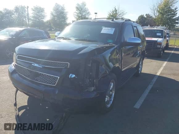 2009 Chevrolet Tahoe LTZ with VIN 1GNFK33219J114669, listed as a IAAI auction lot 43259772 with 176,259 mi miles and . Bid and sale history available at DreamBid. Image 2.
