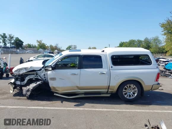 2014 Ram 1500 Longhorn z VIN 1C6RR7PT7ES368846, wystawiony jako IAAI lot #43137351 z przebiegiem 142 136 mil mil oraz . Historia ofert i sprzedaży dostępna na DreamBid. Obrazek 14.