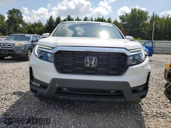 2023 Honda Passport EX-L with VIN 5FNYF8H5XPB018355, listed as a Copart auction lot 66667405 with 26,126 mi miles and Salvage title. Bid and sale history available at DreamBid. Image 5.