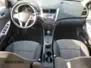 2013 Hyundai Accent GS z VIN KMHCT5AE4DU100415, wystawiony jako Copart lot #63779775 z przebiegiem 102 727 mil mil oraz Szkoda całkowita • Salvage title. Historia ofert i sprzedaży dostępna na DreamBid. Obrazek 8.