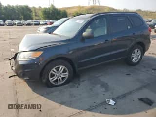 2012 Hyundai Santa Fe GLS с VIN 5XYZGDAB5CG108977, выставлен на аукционе Copart как лот 67138835 с пробегом 175 185 миль миль и Списание • Salvage title. История ставок и продаж доступна на DreamBid. Изображение 1.