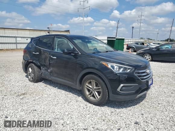 2018 Hyundai Santa Fe 2.4L z VIN 5XYZTDLB8JG541733, wystawiony jako Copart lot #69393845 z przebiegiem 103 792 mil mil oraz Szkoda całkowita • Salvage title. Historia ofert i sprzedaży dostępna na DreamBid. Obrazek 4.