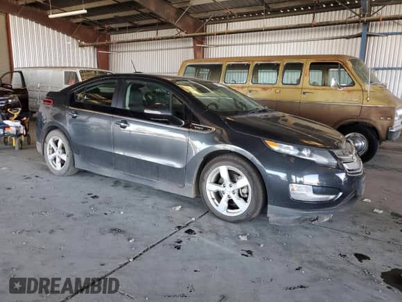 2015 Chevrolet Volt with VIN 1G1RD6E41FU110768, listed as a Copart auction lot 80996335 with 90,363 mi miles and Salvage title. Bid and sale history available at DreamBid. Image 4.