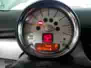 2012 MINI Hardtop with VIN WMWSU3C50CT258623, listed as a Copart auction lot 64395745 with 98,172 mi miles and Salvage title. Bid and sale history available at DreamBid. Image 9.