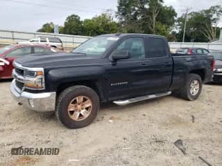 2018 Chevrolet Silverado 1500 LT with VIN 1GCVKREH2JZ363495, listed as a Copart auction lot 80777585 with 56,884 mi miles and Salvage title. Bid and sale history available at DreamBid. Image 1.