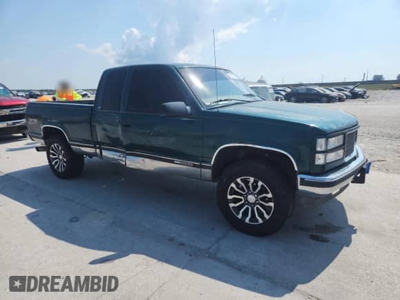1997 GMC Sierra 1500 с VIN 2GTEK19R3V1554913, выставлен на аукционе Copart как лот 80281485 с пробегом 246 907 миль миль и Списание • Salvage title. История ставок и продаж доступна на DreamBid. Изображение 4.