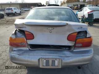 1999 Chevrolet Prizm z VIN 1Y1SK5484XZ401262, wystawiony jako Copart lot #78032974 z przebiegiem 161 904 mil mil oraz Szkoda całkowita • Salvage title. Historia ofert i sprzedaży dostępna na DreamBid. Obrazek 6.