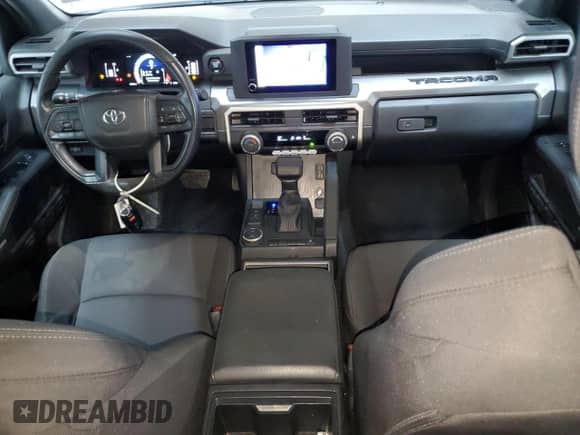 2024 Toyota Tacoma SR5 with VIN 3TMKB5FN2RM011207, listed as a Copart auction lot 80397465 with 28,515 mi miles and Clean title. Bid and sale history available at DreamBid. Image 8.