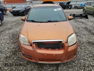 2007 Chevrolet Aveo LS z VIN KL1TD56637B057387, wystawiony jako Copart lot #77928504 z przebiegiem 129 014 mil mil oraz Szkoda całkowita • Salvage title. Historia ofert i sprzedaży dostępna na DreamBid. Obrazek 5.