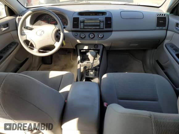 2005 Toyota Camry LE z VIN 4T1BE30K65U576040, wystawiony jako Copart lot #85905805 z przebiegiem 164 760 mil mil oraz Szkoda całkowita • Salvage title. Historia ofert i sprzedaży dostępna na DreamBid. Obrazek 8.