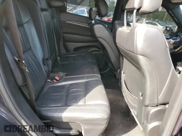 2014 Jeep Grand Cherokee Limited z VIN 1C4RJFBG3EC589231, wystawiony jako Copart lot #71021165 z przebiegiem 94 742 mil mil oraz Szkoda całkowita • Salvage title. Historia ofert i sprzedaży dostępna na DreamBid. Obrazek 11.