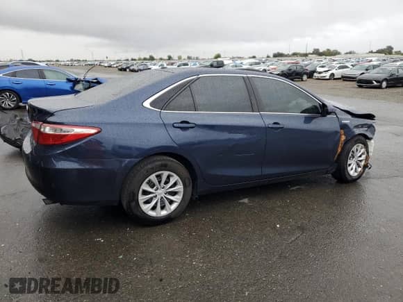2015 Toyota Camry LE с VIN 4T1BD1FKXFU155048, выставлен на аукционе Copart как лот 86591395 с пробегом 61 004 миль миль и Списание • Salvage title. История ставок и продаж доступна на DreamBid. Изображение 3.