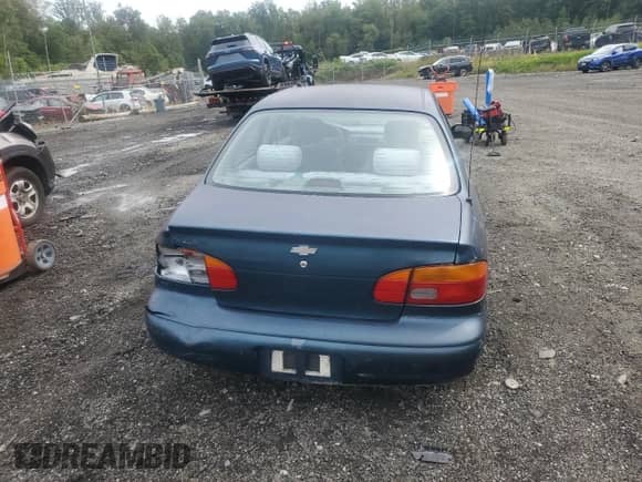 1999 Chevrolet Prizm с VIN 1Y1SK5284XZ409543, выставлен на аукционе Copart как лот 84379805 с пробегом Не указан миль и Списание • Salvage title. История ставок и продаж доступна на DreamBid. Изображение 6.