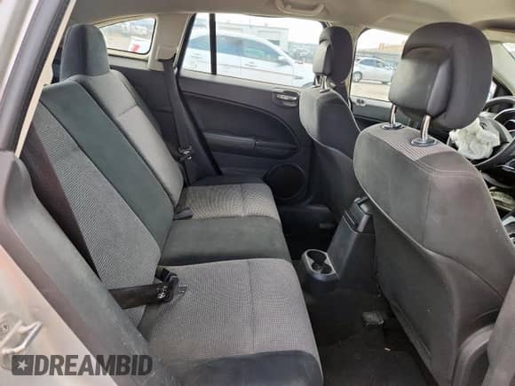 2010 Dodge Caliber Mainstreet with VIN 1B3CB3HA6AD575639, listed as a Copart auction lot 70016165 with 135,683 mi miles and Salvage title. Bid and sale history available at DreamBid. Image 10.