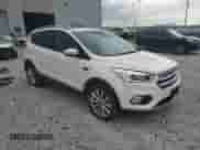 2017 Ford Escape Titanium with VIN 1FMCU0J96HUB81328, listed as a Copart auction lot 69881125 with 70,325 mi miles and Salvage title. Bid and sale history available at DreamBid. Image 4.