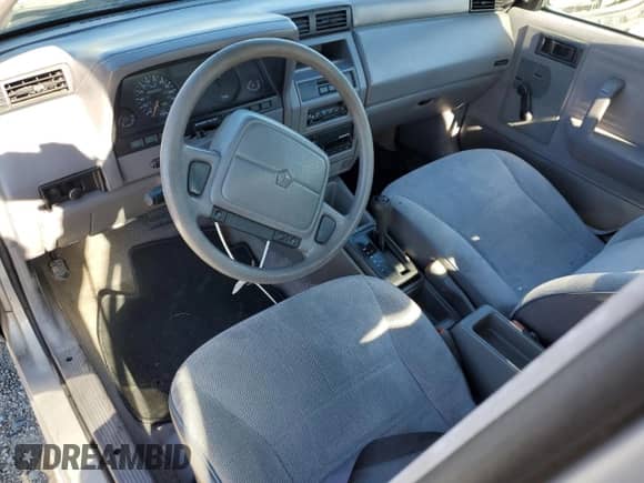 1994 Dodge Shadow with VIN 1B3AP28D5RN193704, listed as a Copart auction lot 82825004 with 90,223 mi miles and Salvage title. Bid and sale history available at DreamBid. Image 8.