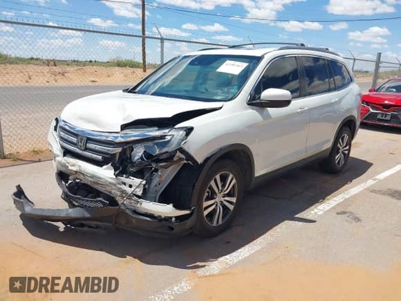2016 Honda Pilot EX-L with VIN 5FNYF6H60GB034903, listed as a IAAI auction lot 42181463 with 82,448 mi miles and . Bid and sale history available at DreamBid. Image 17.