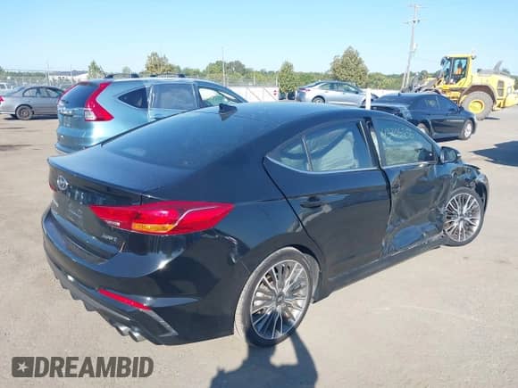 2018 Hyundai Elantra Sport с VIN KMHD04LB1JU509915, выставлен на аукционе IAAI как лот 43205356 с пробегом 98 340 миль миль и . История ставок и продаж доступна на DreamBid. Изображение 4.