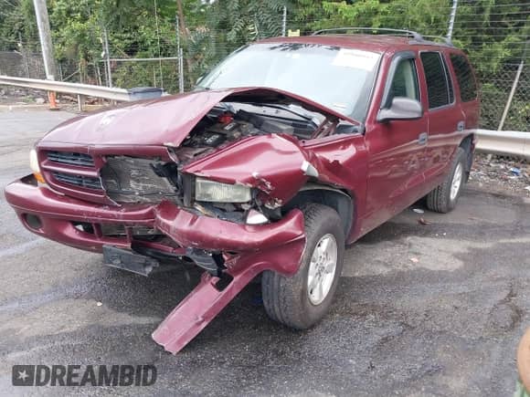 2002 Dodge Durango Sport with VIN 1B4HS38N32F206649, listed as a IAAI auction lot 40725627 with 290,822 mi miles and . Bid and sale history available at DreamBid. Image 2.