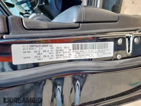 2012 Jeep Grand Cherokee Laredo z VIN 1C4RJEAG4CC258909, wystawiony jako Copart lot #70101885 z przebiegiem 168 332 mil mil oraz Czysty tytuł • Clean title. Historia ofert i sprzedaży dostępna na DreamBid. Obrazek 13.