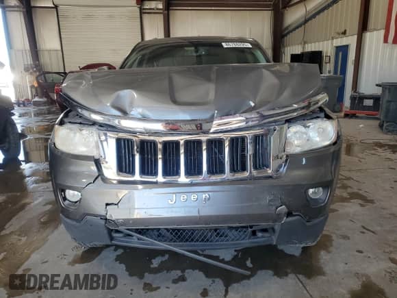 2012 Jeep Grand Cherokee Laredo z VIN 1C4RJFAG8CC158060, wystawiony jako Copart lot #86788295 z przebiegiem 132 937 mil mil oraz Szkoda całkowita • Salvage title. Historia ofert i sprzedaży dostępna na DreamBid. Obrazek 5.