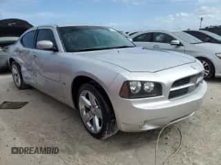 2010 Dodge Charger SXT с VIN 2B3CA3CV9AH312772, выставлен на аукционе Copart как лот 72427744 с пробегом 135 137 миль миль и Списание • Salvage title. История ставок и продаж доступна на DreamBid. Изображение 4.