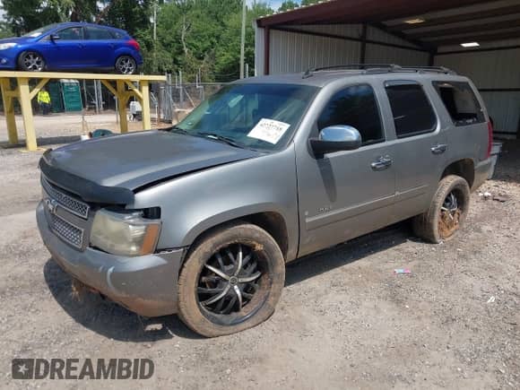 2009 Chevrolet Tahoe LTZ с VIN 1GNFK330X9R262884, выставлен на аукционе IAAI как лот 42727718 с пробегом 305 785 миль миль и . История ставок и продаж доступна на DreamBid. Изображение 2.