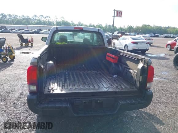 2018 Toyota Tacoma SR с VIN 5TFRX5GNXJX125176, выставлен на аукционе IAAI как лот 42257481 с пробегом 99 418 миль миль и . История ставок и продаж доступна на DreamBid. Изображение 16.