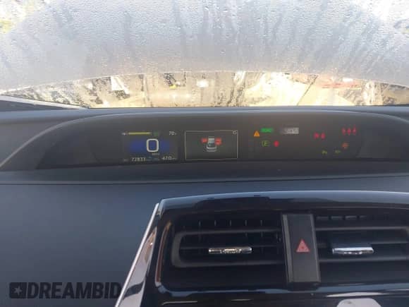 2021 Toyota Prius LE with VIN JTDL9MFU8M3028928, listed as a IAAI auction lot 43099318 with 72,833 mi miles and . Bid and sale history available at DreamBid. Image 7.