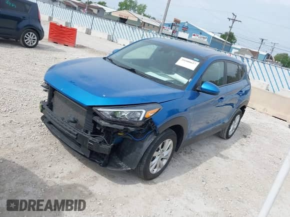 2019 Hyundai Tucson SE z VIN KM8J23A40KU886328, wystawiony jako IAAI lot #39500657 z przebiegiem 56 117 mil mil oraz . Historia ofert i sprzedaży dostępna na DreamBid. Obrazek 2.