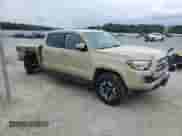 2017 Toyota Tacoma SR5 with VIN 3TMBZ5DN9HM012089, listed as a Copart auction lot 86295415 with 221,378 mi miles and Salvage title. Bid and sale history available at DreamBid. Image 4.