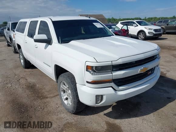 2016 Chevrolet Silverado 1500 LT with VIN 3GCUKRECXGG291194, listed as a IAAI auction lot 42397738 with 185,764 mi miles and . Bid and sale history available at DreamBid. Image 1.