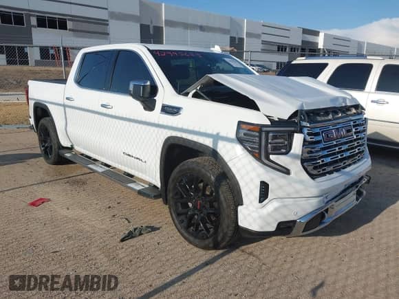 2023 GMC Sierra 1500 Denali z VIN 3GTUUGED4PG345211, wystawiony jako IAAI lot #42995625 z przebiegiem 63 396 mil mil oraz . Historia ofert i sprzedaży dostępna na DreamBid. Obrazek 1.