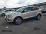 2017 Ford Escape Titanium with VIN 1FMCU9JDXHUC37599, listed as a Copart auction lot 69261175 with 110,175 mi miles and Salvage title. Bid and sale history available at DreamBid. Image 1.