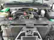 2003 Chevrolet Silverado 2500HD LT z VIN 1GCHK23173F221965, wystawiony jako Copart lot #66506715 z przebiegiem 291 086 mil mil oraz Szkoda całkowita • Salvage title. Historia ofert i sprzedaży dostępna na DreamBid. Obrazek 11.