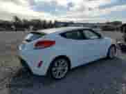2012 Hyundai Veloster w/Gray Int z VIN KMHTC6AD0CU056764, wystawiony jako Copart lot #84646725 z przebiegiem 157 456 mil mil oraz Czysty tytuł • Clean title. Historia ofert i sprzedaży dostępna na DreamBid. Obrazek 3.