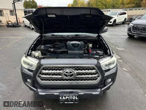 2017 Toyota Tacoma TRD Off Road z VIN 3TMDZ5BNXHM023386, wystawiony jako Copart lot #90888765 z przebiegiem 193 045 mil mil oraz Czysty tytuł • Clean title. Historia ofert i sprzedaży dostępna na DreamBid. Obrazek 5.
