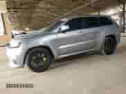 2018 Jeep Grand Cherokee Trackhawk z VIN 1C4RJFN98JC408289, wystawiony jako Copart lot #71044265 z przebiegiem 54 062 mil mil oraz Szkoda całkowita • Salvage title. Historia ofert i sprzedaży dostępna na DreamBid. Obrazek 1.