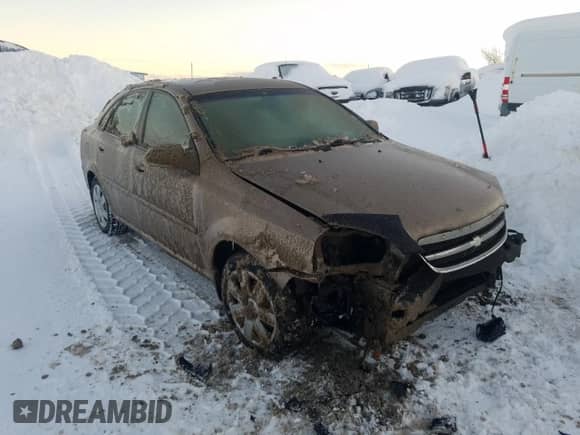2004 Chevrolet Optra с VIN KL1JD52Z44K944399, выставлен на аукционе Copart как лот 83368844 с пробегом Не указан миль и Списание • Salvage title. История ставок и продаж доступна на DreamBid. Изображение 4.